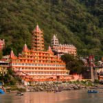 View of Ganga river embankment, Lakshman Jhula bridge and Tera Manzil Temple, Trimbakeshwar in Rishikesh