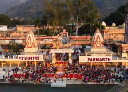 hindu temple filled with crowed at evening form religious prayer image is taken at parmarth niketan rishikesh uttrakhand india on Mar 15 2022.