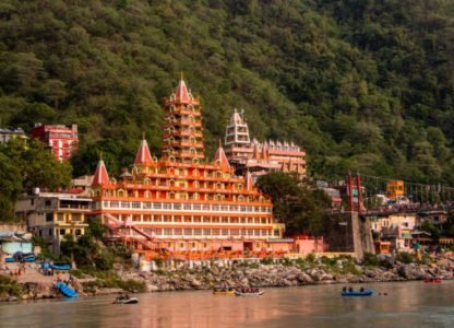 View of Ganga river embankment, Lakshman Jhula bridge and Tera Manzil Temple, Trimbakeshwar in Rishikesh